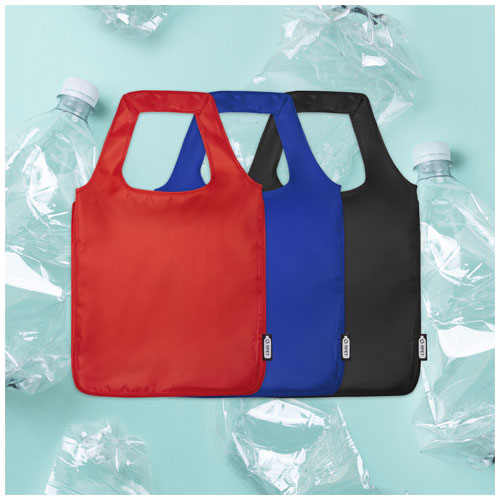 Empty,Rumpled,Used,Plastic,Bottle,On,Blue,Background.,Top,View,